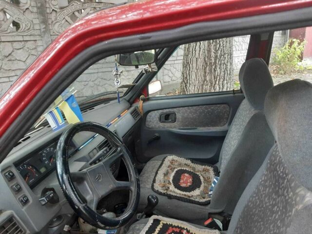 Красный ЗАЗ 1103 Славута, объемом двигателя 1.2 л и пробегом 205 тыс. км за 1087 $, фото 2 на Automoto.ua