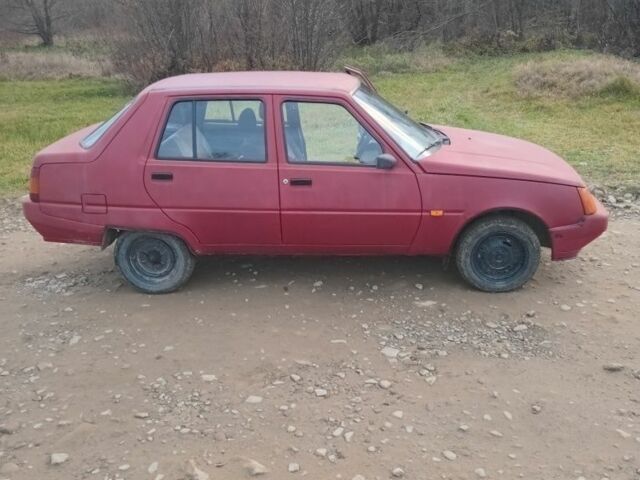 Красный ЗАЗ 1103 Славута, объемом двигателя 1.2 л и пробегом 103 тыс. км за 400 $, фото 2 на Automoto.ua