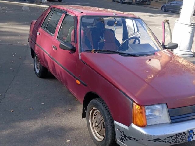 Красный ЗАЗ 1103 Славута, объемом двигателя 1.2 л и пробегом 140 тыс. км за 650 $, фото 1 на Automoto.ua