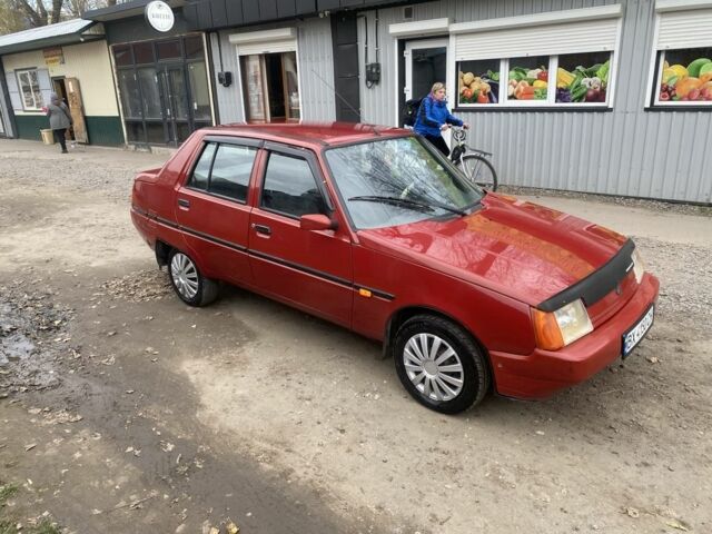 Красный ЗАЗ 1103 Славута, объемом двигателя 1.2 л и пробегом 140 тыс. км за 1000 $, фото 1 на Automoto.ua