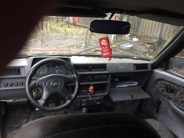 Красный ЗАЗ 1103 Славута, объемом двигателя 1.2 л и пробегом 119 тыс. км за 850 $, фото 3 на Automoto.ua