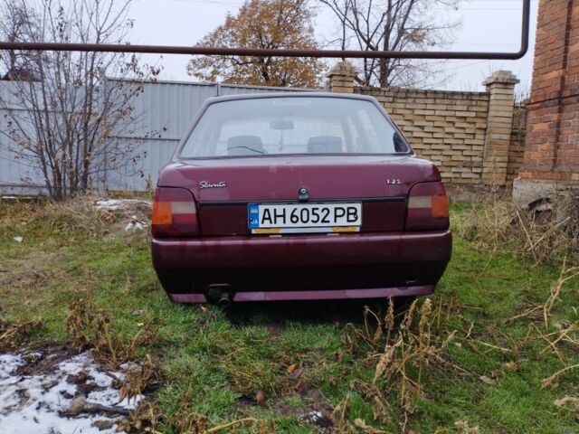 Красный ЗАЗ 1103 Славута, объемом двигателя 1.2 л и пробегом 140 тыс. км за 1000 $, фото 1 на Automoto.ua