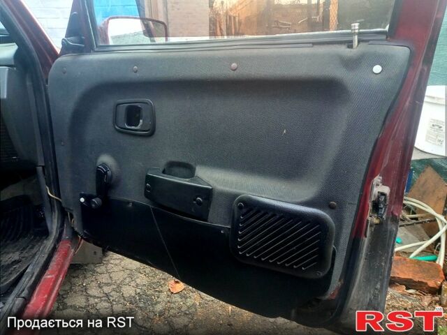 Красный ЗАЗ 1103 Славута, объемом двигателя 1.1 л и пробегом 238 тыс. км за 400 $, фото 5 на Automoto.ua