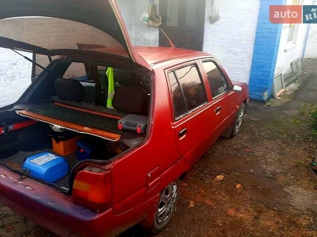 Красный ЗАЗ 1103 Славута, объемом двигателя 1.1 л и пробегом 238 тыс. км за 400 $, фото 6 на Automoto.ua