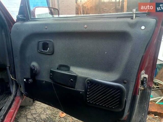 Красный ЗАЗ 1103 Славута, объемом двигателя 1.1 л и пробегом 238 тыс. км за 400 $, фото 3 на Automoto.ua