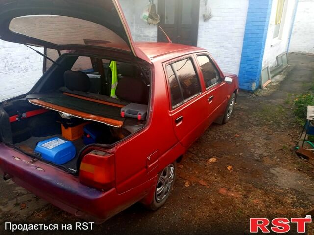 Красный ЗАЗ 1103 Славута, объемом двигателя 1.1 л и пробегом 238 тыс. км за 400 $, фото 8 на Automoto.ua