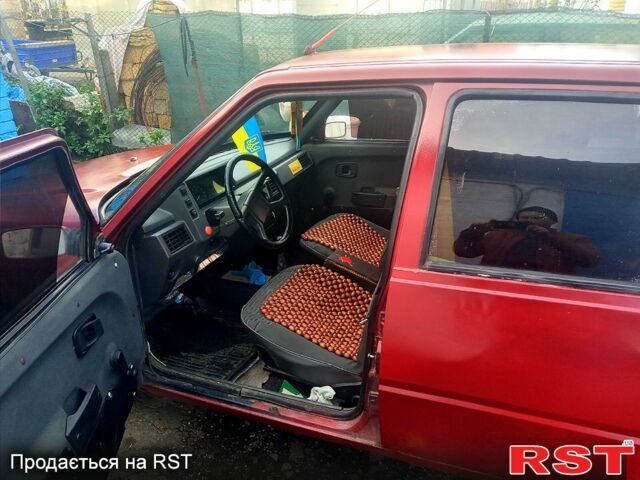 Красный ЗАЗ 1103 Славута, объемом двигателя 1.1 л и пробегом 238 тыс. км за 400 $, фото 6 на Automoto.ua