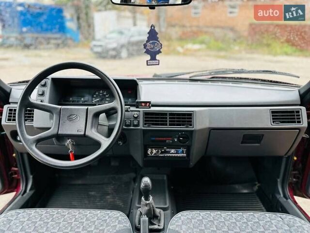 Червоний ЗАЗ 1103 Славута, об'ємом двигуна 1.2 л та пробігом 85 тис. км за 1900 $, фото 27 на Automoto.ua