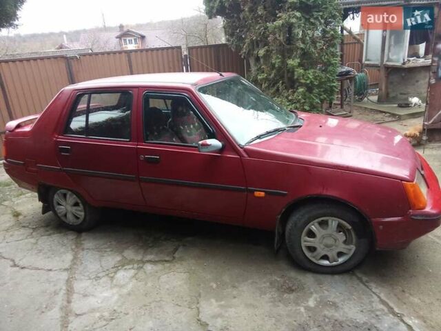 Красный ЗАЗ 1103 Славута, объемом двигателя 1.2 л и пробегом 120 тыс. км за 700 $, фото 3 на Automoto.ua