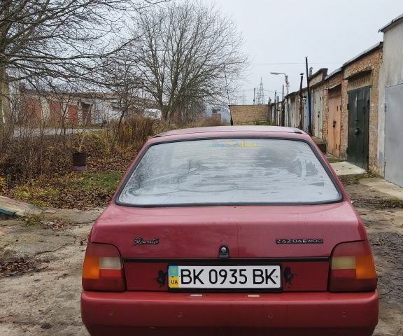 Красный ЗАЗ 1103 Славута, объемом двигателя 1.2 л и пробегом 83 тыс. км за 850 $, фото 19 на Automoto.ua