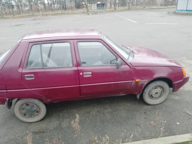 Красный ЗАЗ 1103 Славута, объемом двигателя 1.2 л и пробегом 150 тыс. км за 688 $, фото 3 на Automoto.ua