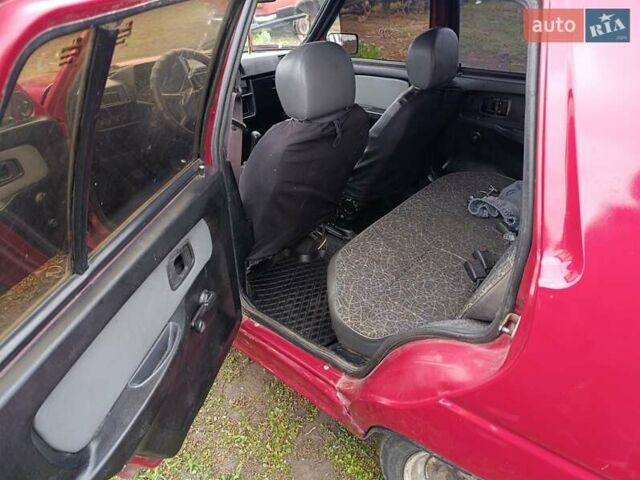 Красный ЗАЗ 1103 Славута, объемом двигателя 1.2 л и пробегом 132 тыс. км за 800 $, фото 2 на Automoto.ua