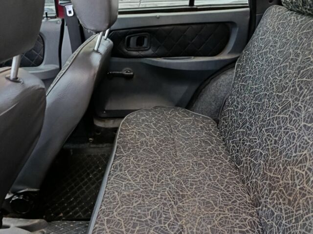 Красный ЗАЗ 1103 Славута, объемом двигателя 1.2 л и пробегом 170 тыс. км за 1300 $, фото 3 на Automoto.ua