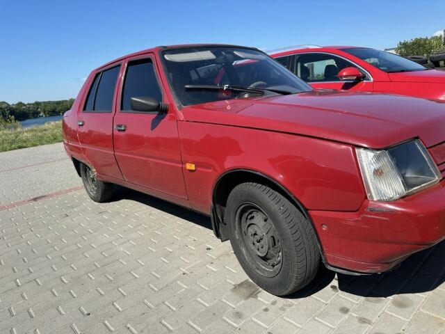 Красный ЗАЗ 1103 Славута, объемом двигателя 1.2 л и пробегом 70 тыс. км за 699 $, фото 1 на Automoto.ua