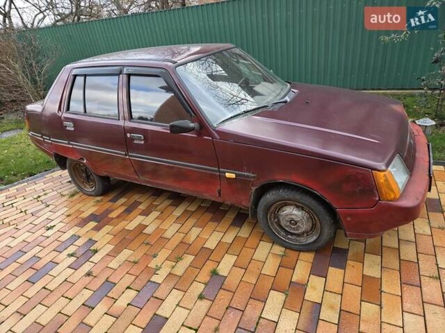 Красный ЗАЗ 1103 Славута, объемом двигателя 1.2 л и пробегом 100 тыс. км за 600 $, фото 1 на Automoto.ua