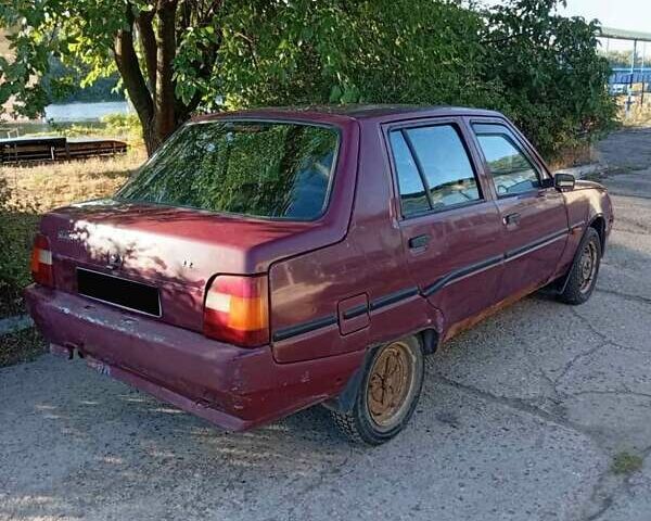 Красный ЗАЗ 1103 Славута, объемом двигателя 1.2 л и пробегом 192 тыс. км за 600 $, фото 1 на Automoto.ua