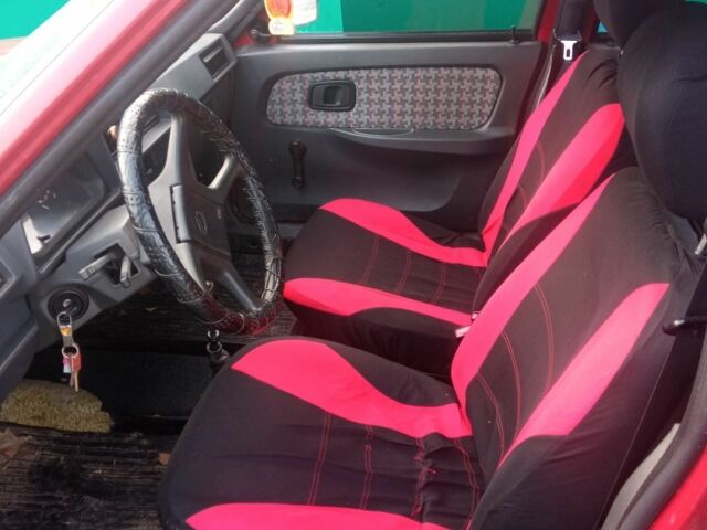 Красный ЗАЗ 1103 Славута, объемом двигателя 1.1 л и пробегом 300 тыс. км за 550 $, фото 3 на Automoto.ua