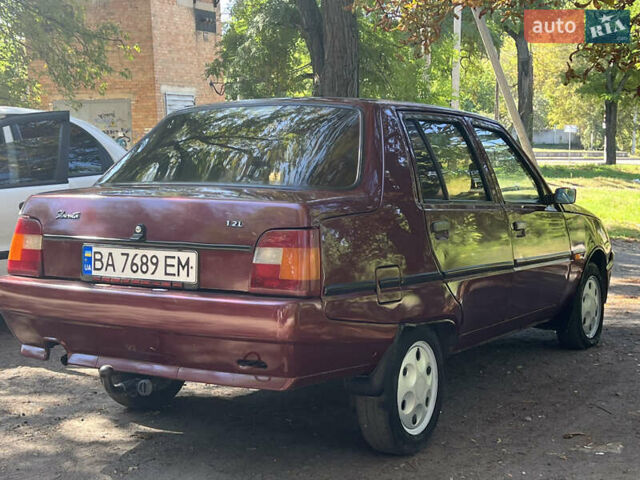 Красный ЗАЗ 1103 Славута, объемом двигателя 1.2 л и пробегом 140 тыс. км за 1650 $, фото 5 на Automoto.ua