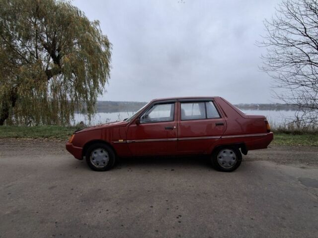 Красный ЗАЗ 1103 Славута, объемом двигателя 1.2 л и пробегом 65 тыс. км за 1050 $, фото 3 на Automoto.ua