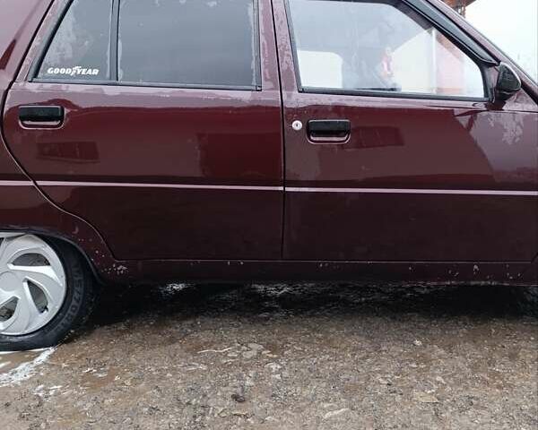 Красный ЗАЗ 1103 Славута, объемом двигателя 1.2 л и пробегом 100 тыс. км за 1100 $, фото 6 на Automoto.ua