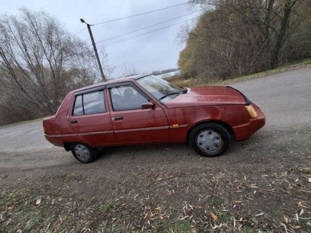 Красный ЗАЗ 1103 Славута, объемом двигателя 1.2 л и пробегом 65 тыс. км за 1050 $, фото 1 на Automoto.ua