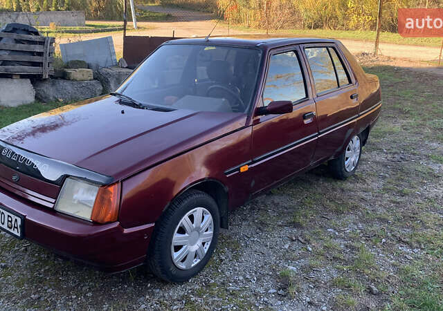 Красный ЗАЗ 1103 Славута, объемом двигателя 1.2 л и пробегом 166 тыс. км за 1350 $, фото 5 на Automoto.ua