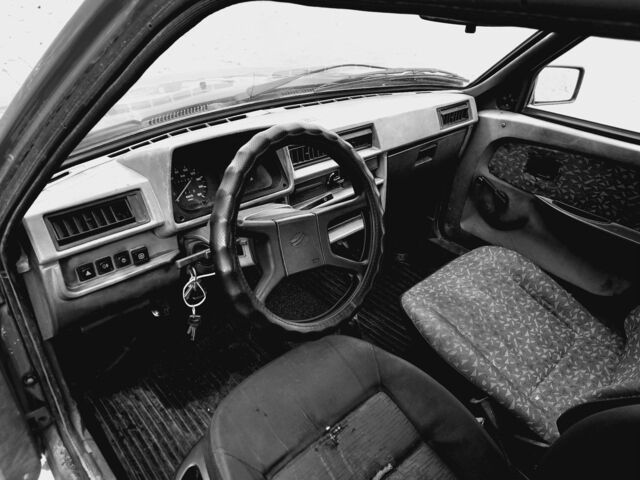 Красный ЗАЗ 1103 Славута, объемом двигателя 1.2 л и пробегом 135 тыс. км за 1150 $, фото 5 на Automoto.ua