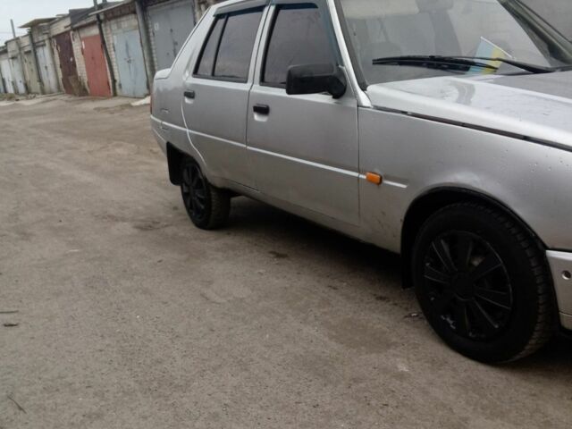 Серый ЗАЗ 1103 Славута, объемом двигателя 1.2 л и пробегом 240 тыс. км за 840 $, фото 2 на Automoto.ua