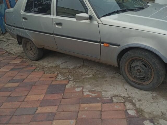 Серый ЗАЗ 1103 Славута, объемом двигателя 1.2 л и пробегом 170 тыс. км за 547 $, фото 1 на Automoto.ua