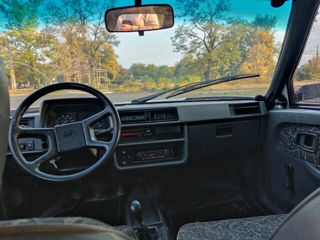 Серый ЗАЗ 1103 Славута, объемом двигателя 1.2 л и пробегом 100 тыс. км за 594 $, фото 7 на Automoto.ua