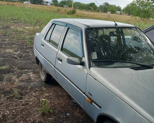 Серый ЗАЗ 1103 Славута, объемом двигателя 1.2 л и пробегом 200 тыс. км за 1300 $, фото 1 на Automoto.ua