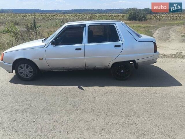 Серый ЗАЗ 1103 Славута, объемом двигателя 1.2 л и пробегом 250 тыс. км за 900 $, фото 1 на Automoto.ua