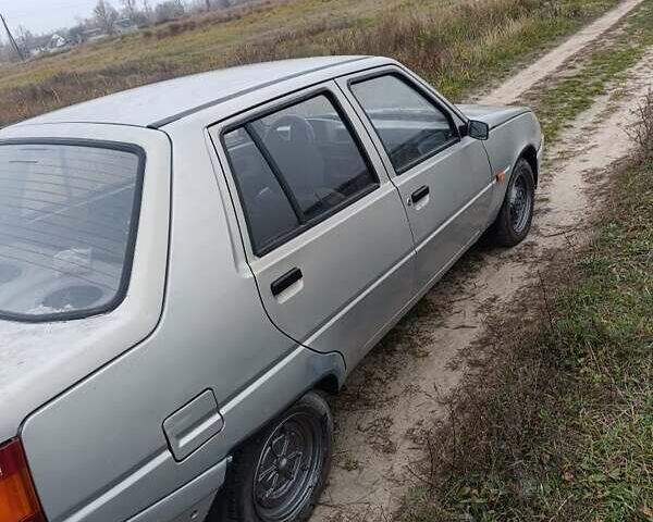 Серый ЗАЗ 1103 Славута, объемом двигателя 1.2 л и пробегом 200 тыс. км за 1000 $, фото 1 на Automoto.ua