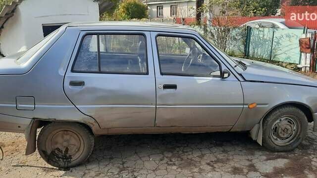 Серый ЗАЗ 1103 Славута, объемом двигателя 1.1 л и пробегом 227 тыс. км за 700 $, фото 2 на Automoto.ua