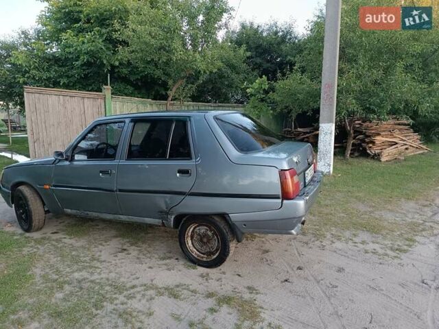 Серый ЗАЗ 1103 Славута, объемом двигателя 1.2 л и пробегом 75 тыс. км за 700 $, фото 1 на Automoto.ua