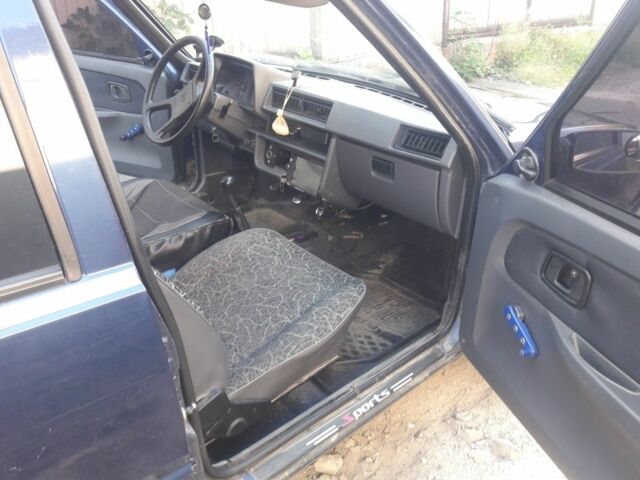 Синий ЗАЗ 1103 Славута, объемом двигателя 1 л и пробегом 69 тыс. км за 698 $, фото 5 на Automoto.ua