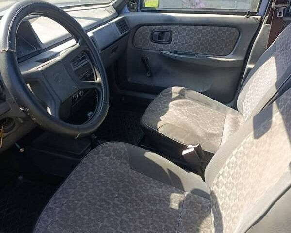 Синий ЗАЗ 1103 Славута, объемом двигателя 1.2 л и пробегом 214 тыс. км за 550 $, фото 3 на Automoto.ua