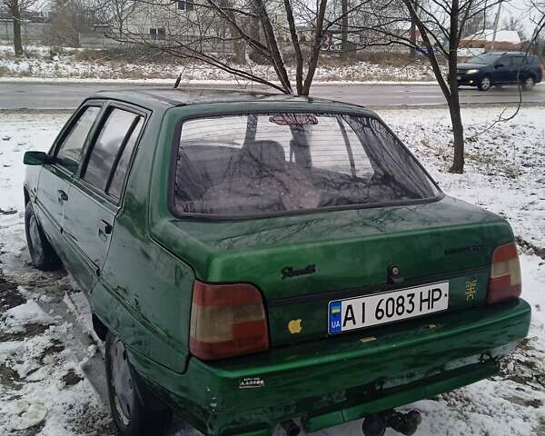 Зелений ЗАЗ 1103 Славута, об'ємом двигуна 1.2 л та пробігом 150 тис. км за 1150 $, фото 21 на Automoto.ua