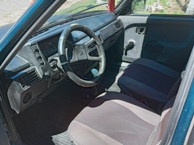 Зеленый ЗАЗ 1103 Славута, объемом двигателя 1.2 л и пробегом 100 тыс. км за 663 $, фото 4 на Automoto.ua