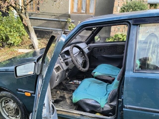 Зеленый ЗАЗ 1103 Славута, объемом двигателя 1.2 л и пробегом 100 тыс. км за 380 $, фото 4 на Automoto.ua