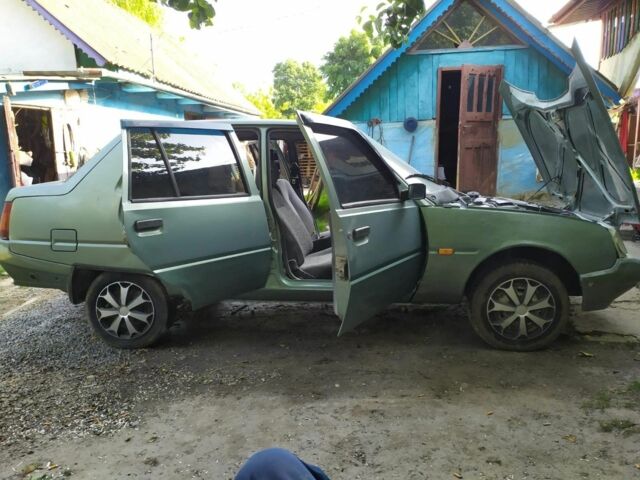 Зеленый ЗАЗ 1103 Славута, объемом двигателя 1.2 л и пробегом 180 тыс. км за 800 $, фото 1 на Automoto.ua