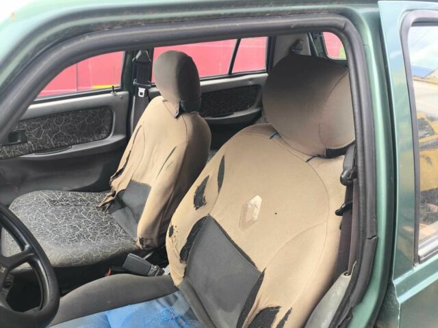 Зеленый ЗАЗ 1103 Славута, объемом двигателя 1.2 л и пробегом 223 тыс. км за 18000 $, фото 13 на Automoto.ua