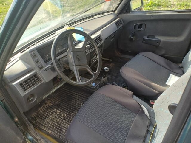 Зеленый ЗАЗ 1103 Славута, объемом двигателя 1.2 л и пробегом 300 тыс. км за 600 $, фото 4 на Automoto.ua