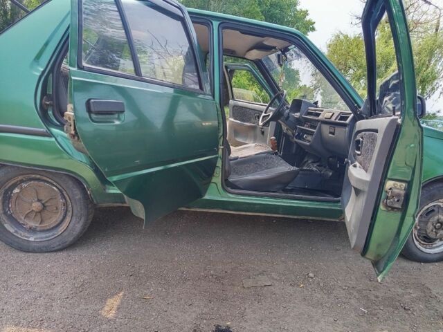 Зелений ЗАЗ 1103 Славута, об'ємом двигуна 1.2 л та пробігом 100 тис. км за 1150 $, фото 8 на Automoto.ua