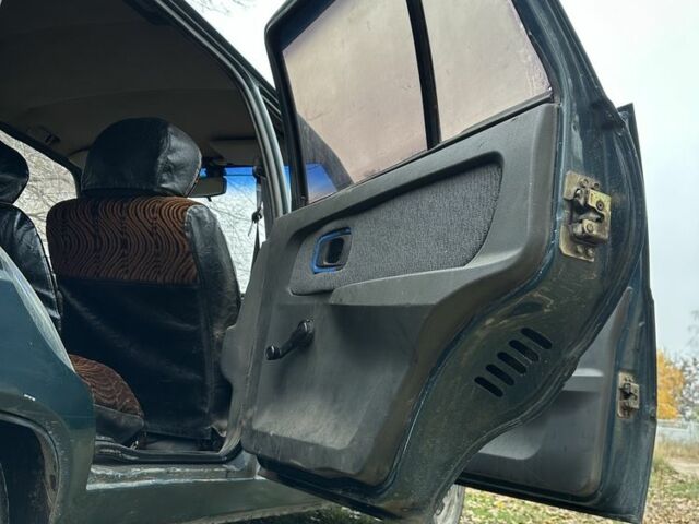 Зеленый ЗАЗ 1103 Славута, объемом двигателя 1.3 л и пробегом 150 тыс. км за 800 $, фото 12 на Automoto.ua