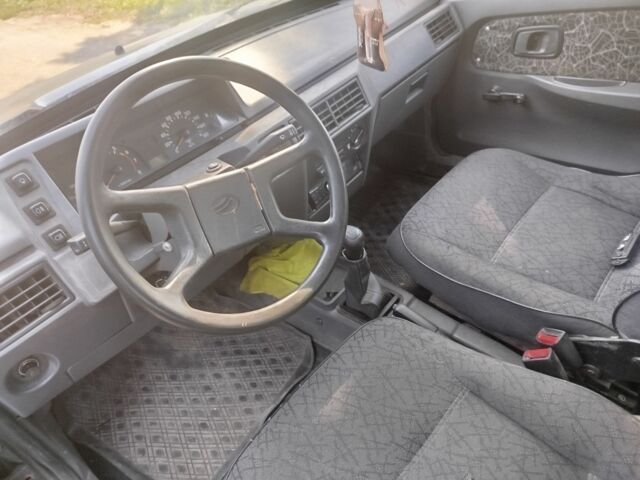 Зеленый ЗАЗ 1103 Славута, объемом двигателя 1 л и пробегом 163 тыс. км за 850 $, фото 4 на Automoto.ua