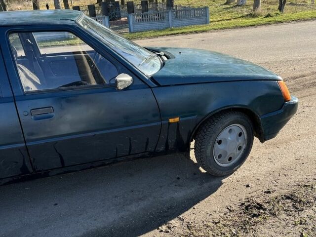 Зеленый ЗАЗ 1103 Славута, объемом двигателя 1.2 л и пробегом 145 тыс. км за 700 $, фото 6 на Automoto.ua