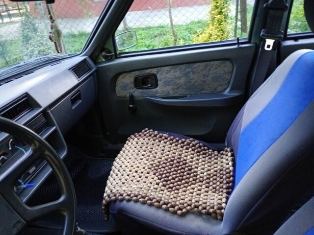 Зелений ЗАЗ 1103 Славута, об'ємом двигуна 1 л та пробігом 99 тис. км за 1048 $, фото 4 на Automoto.ua