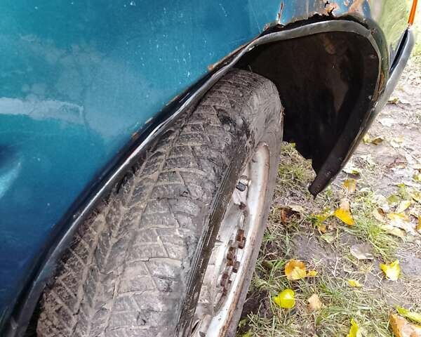 Зеленый ЗАЗ 1103 Славута, объемом двигателя 1.1 л и пробегом 187 тыс. км за 900 $, фото 6 на Automoto.ua