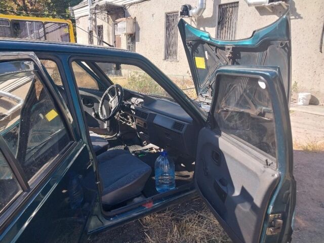 Зеленый ЗАЗ 1103 Славута, объемом двигателя 1.2 л и пробегом 100 тыс. км за 1000 $, фото 5 на Automoto.ua